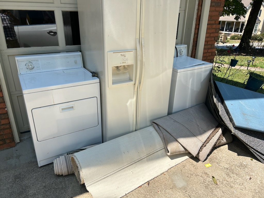 Real refrigerator and washer staged for single item pickup